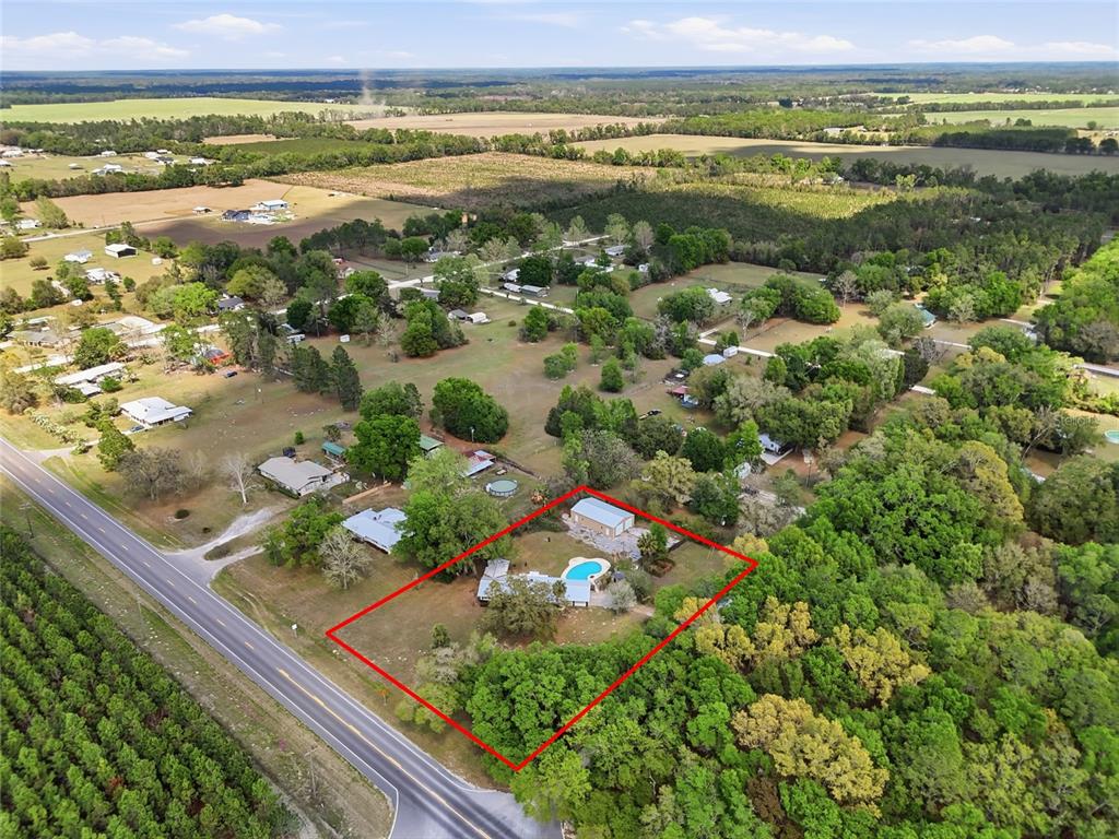 980 Southwest 105th Street Trenton, FL 32693 - Photo 1 of 43 a view of a city with an ocean