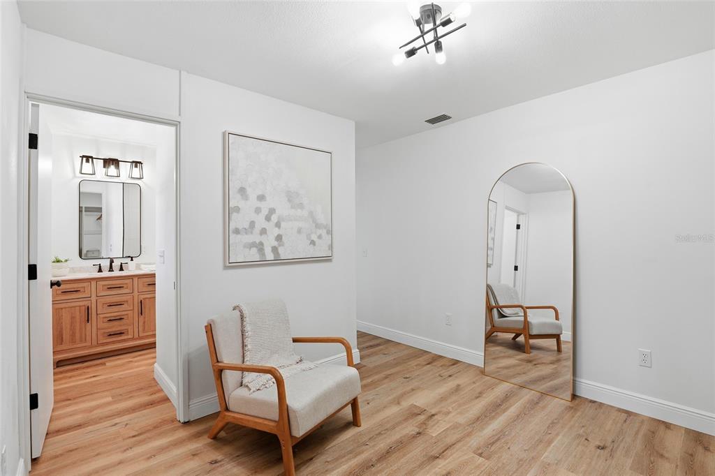 980 Southwest 105th Street Trenton, FL 32693 - Photo 18 of 43 a room with furniture and wooden floor