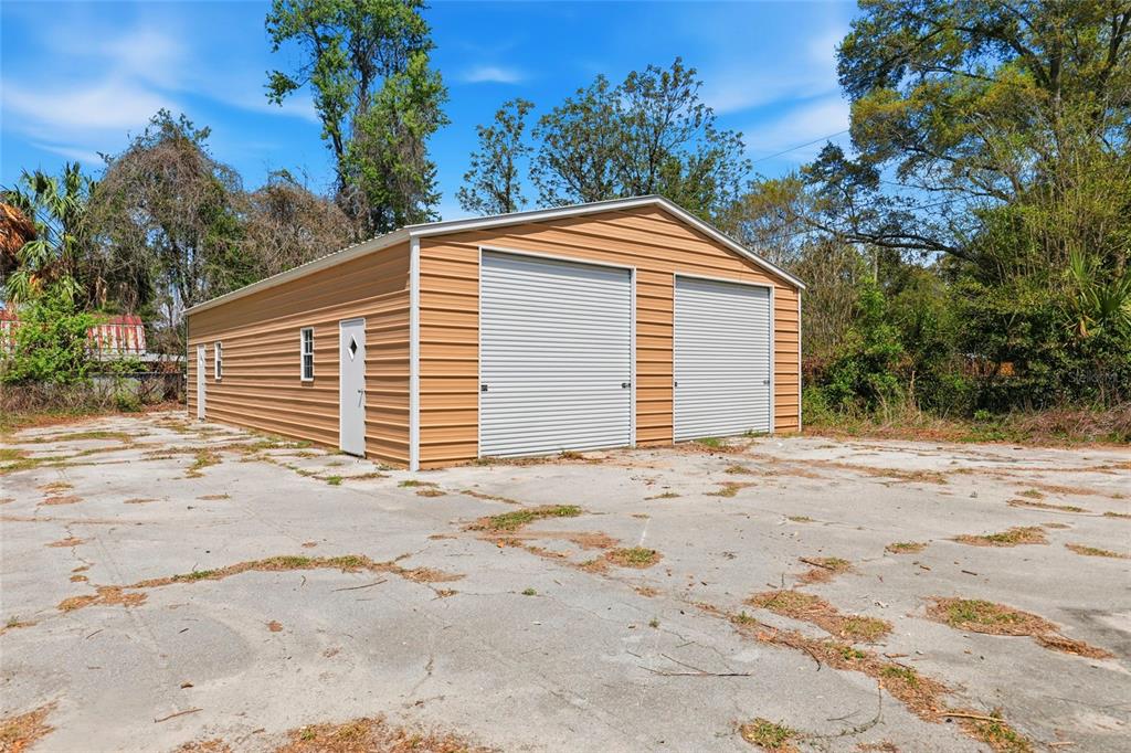 980 Southwest 105th Street Trenton, FL 32693 - Photo 31 of 43 a view of a house with a yard