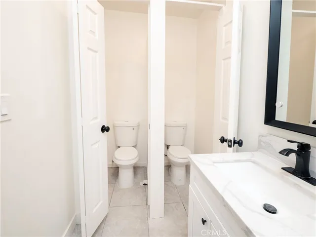 a bathroom with a sink and a toilet