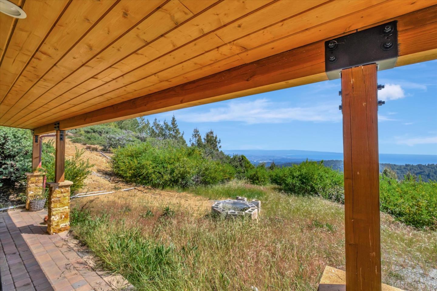 620 Maymens Flat Road Los Gatos, CA 95033 - Photo 11 of 42 a view of a back yard of the house