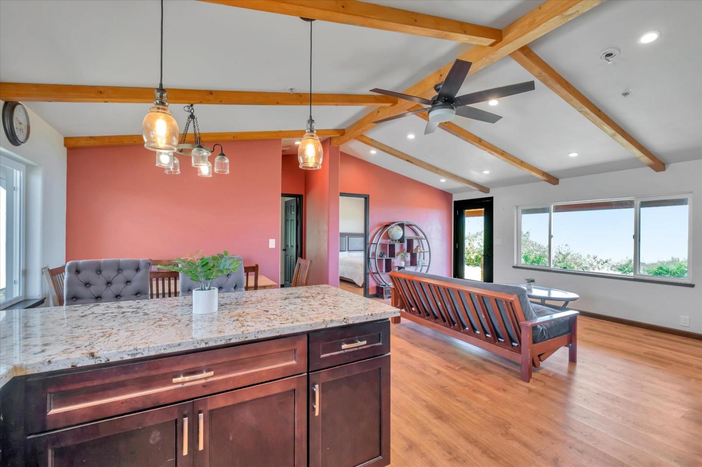 620 Maymens Flat Road Los Gatos, CA 95033 - Photo 20 of 42 a room with chandelier fan and wooden floor