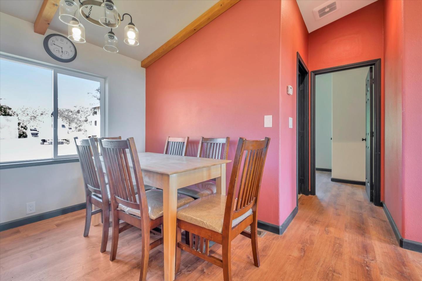 620 Maymens Flat Road Los Gatos, CA 95033 - Photo 21 of 42 a dining room with furniture and wooden floor