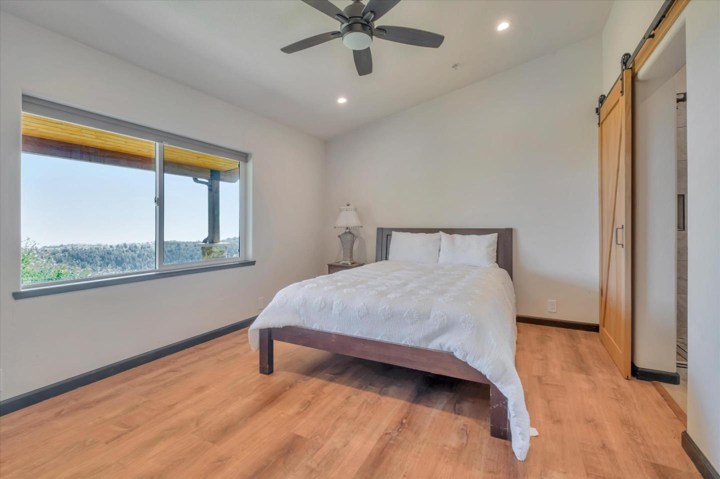 620 Maymens Flat Road Los Gatos, CA 95033 - Photo 29 of 42 a bedroom with a bed and window
