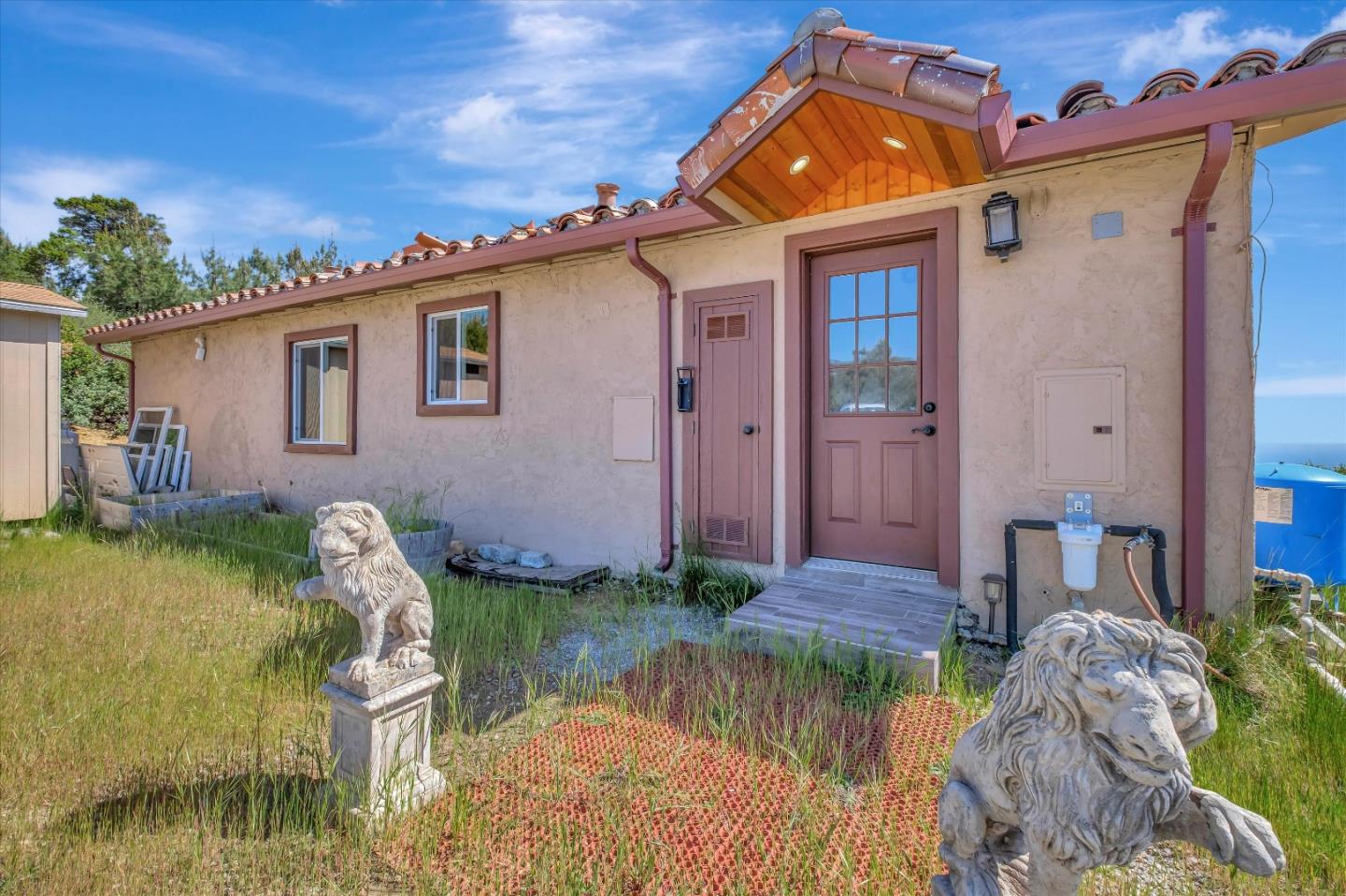 620 Maymens Flat Road Los Gatos, CA 95033 - Photo 6 of 42 a backyard of a house with yard table and chairs