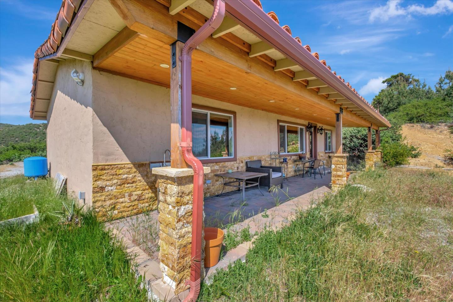 620 Maymens Flat Road Los Gatos, CA 95033 - Photo 9 of 42 a view of a patio with table and chairs and potted plants