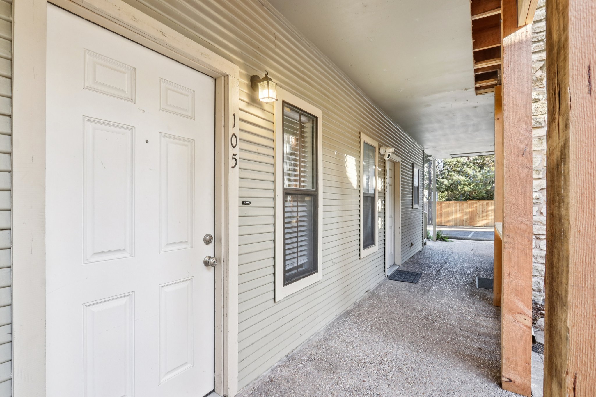 4401 Speedway, Unit 105 Austin, TX 78751 - Photo 13 of 38 The covered walkway keeps everything cool and shaded, bringing an easy breezy feel to coming home.