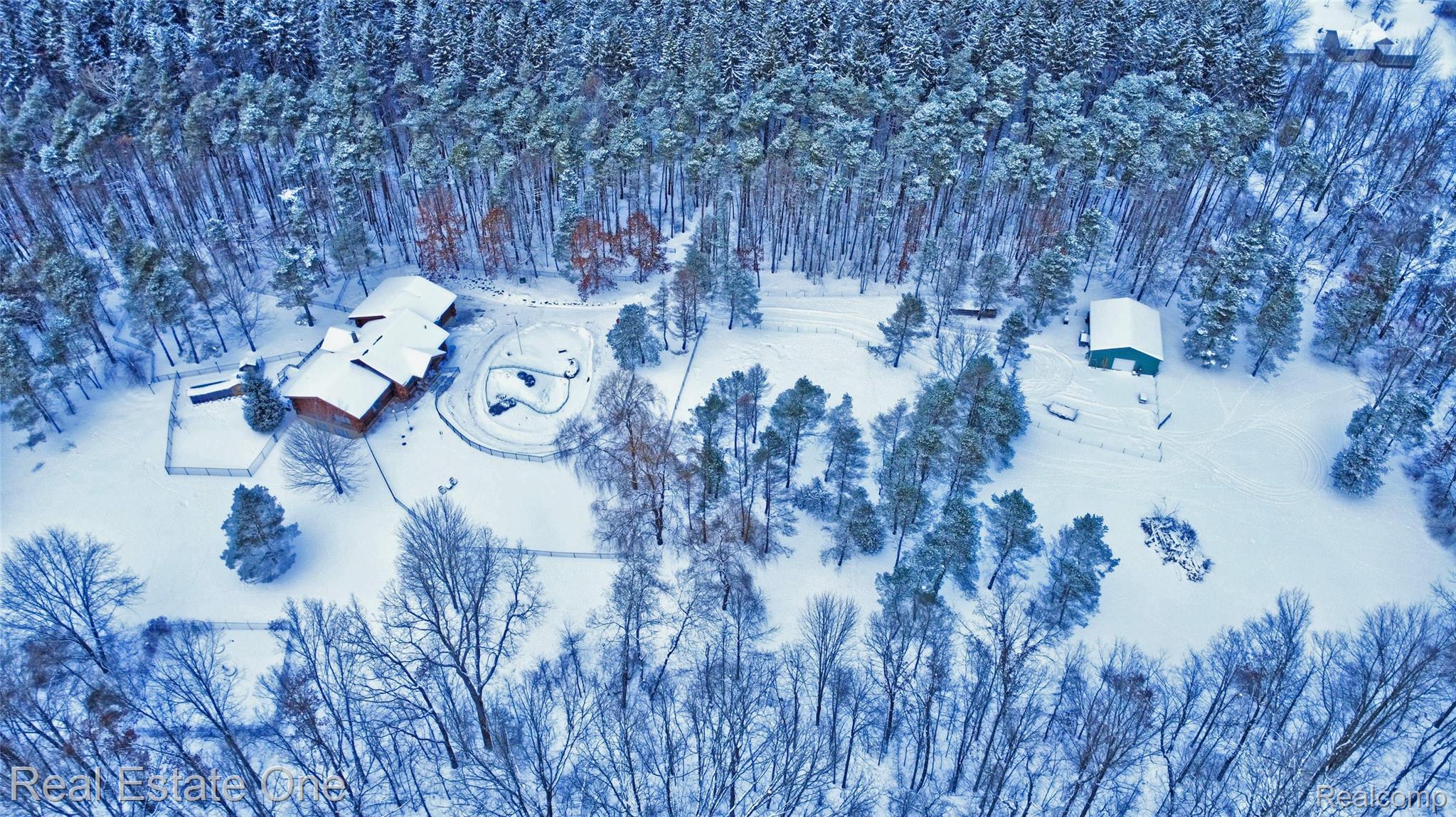 4340 Lahring Road Holly, MI 48442 - Photo 86 of 89 Aerial view of property's location with a forest