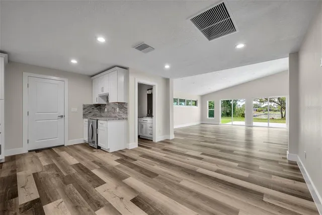 a view of kitchen and windows