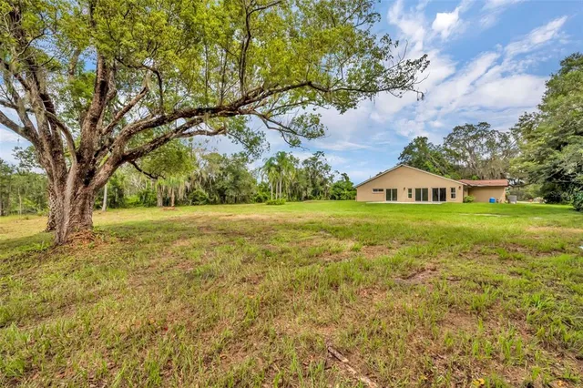 a view of swimming pool with an outdoor space and seating area