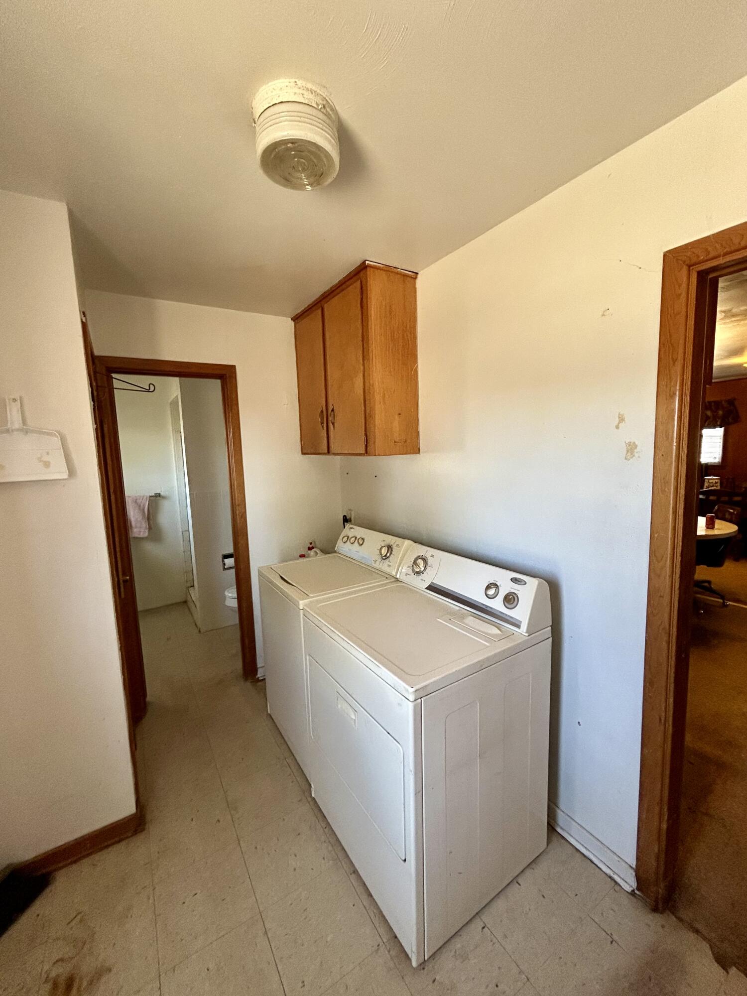2101 Farm To Market 97 Lockney, TX 79241 - Photo 19 of 35 a utility room with dryer and washer