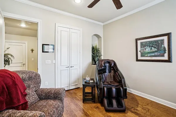 a view of a livingroom with furniture and wooden floor