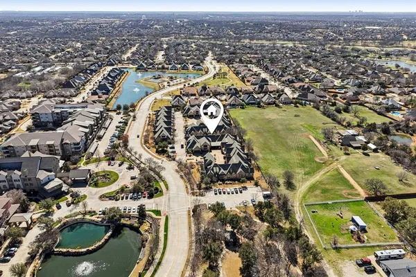 an aerial view of residential building and lake view