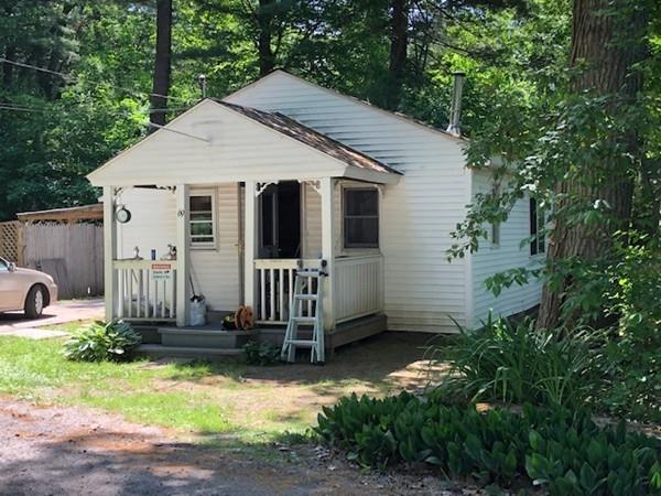 69 Pine Road Charlton, MA 01507 - Photo 4 of 26 a view of a house with a yard