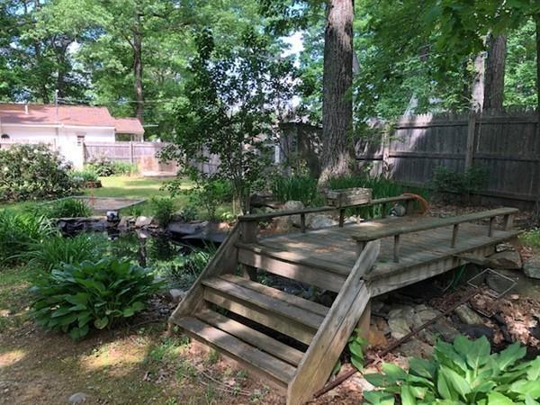 69 Pine Road Charlton, MA 01507 - Photo 9 of 26 a view of a backyard with plants