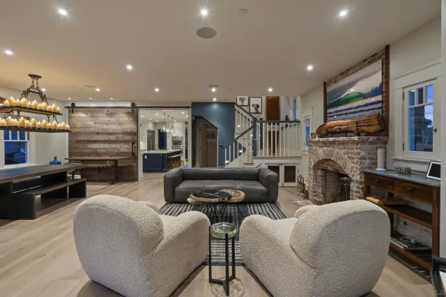 a bathroom with a sink toilet and window