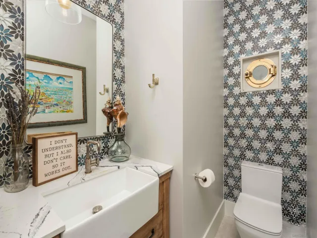 a kitchen with stainless steel appliances granite countertop a sink and stove