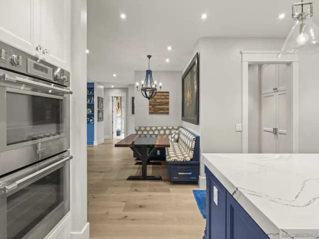 a front view of a house with swimming pool yard and outdoor seating