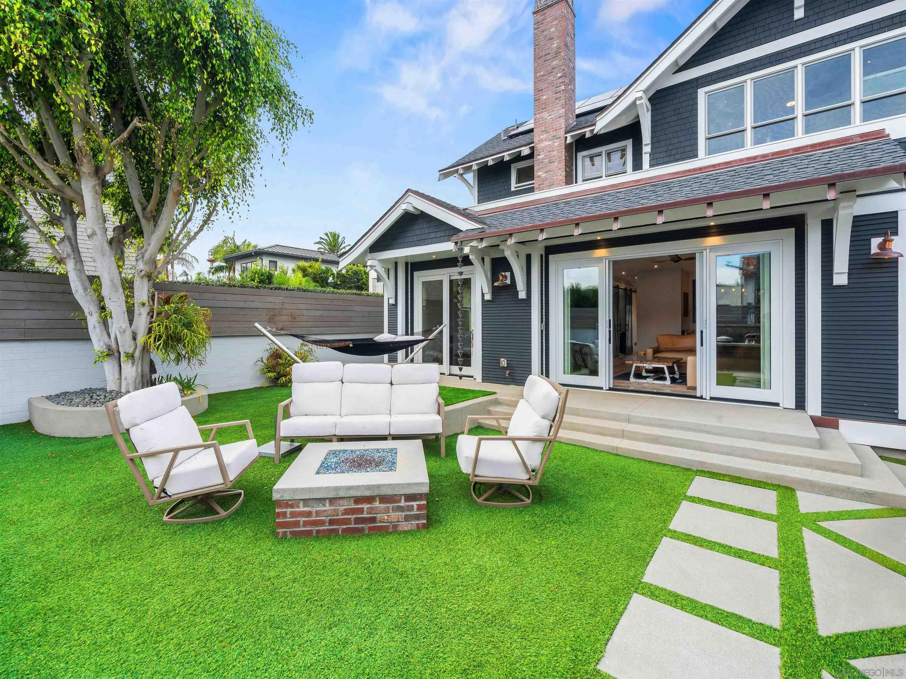 1027 G Avenue Coronado, CA 92118 - Photo 27 of 59 a view of a house with a yard porch and sitting area