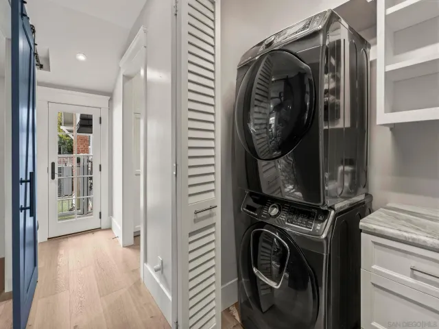 a bathroom with a shower toilet and sink