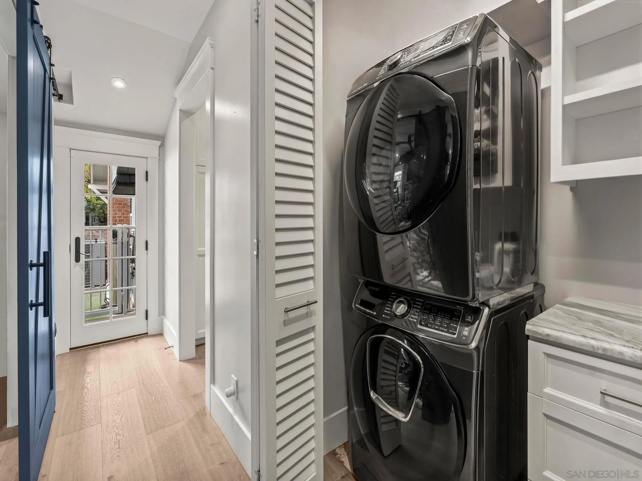 1027 G Avenue Coronado, CA 92118 - Photo 32 of 59 a utility room with dryer and washer