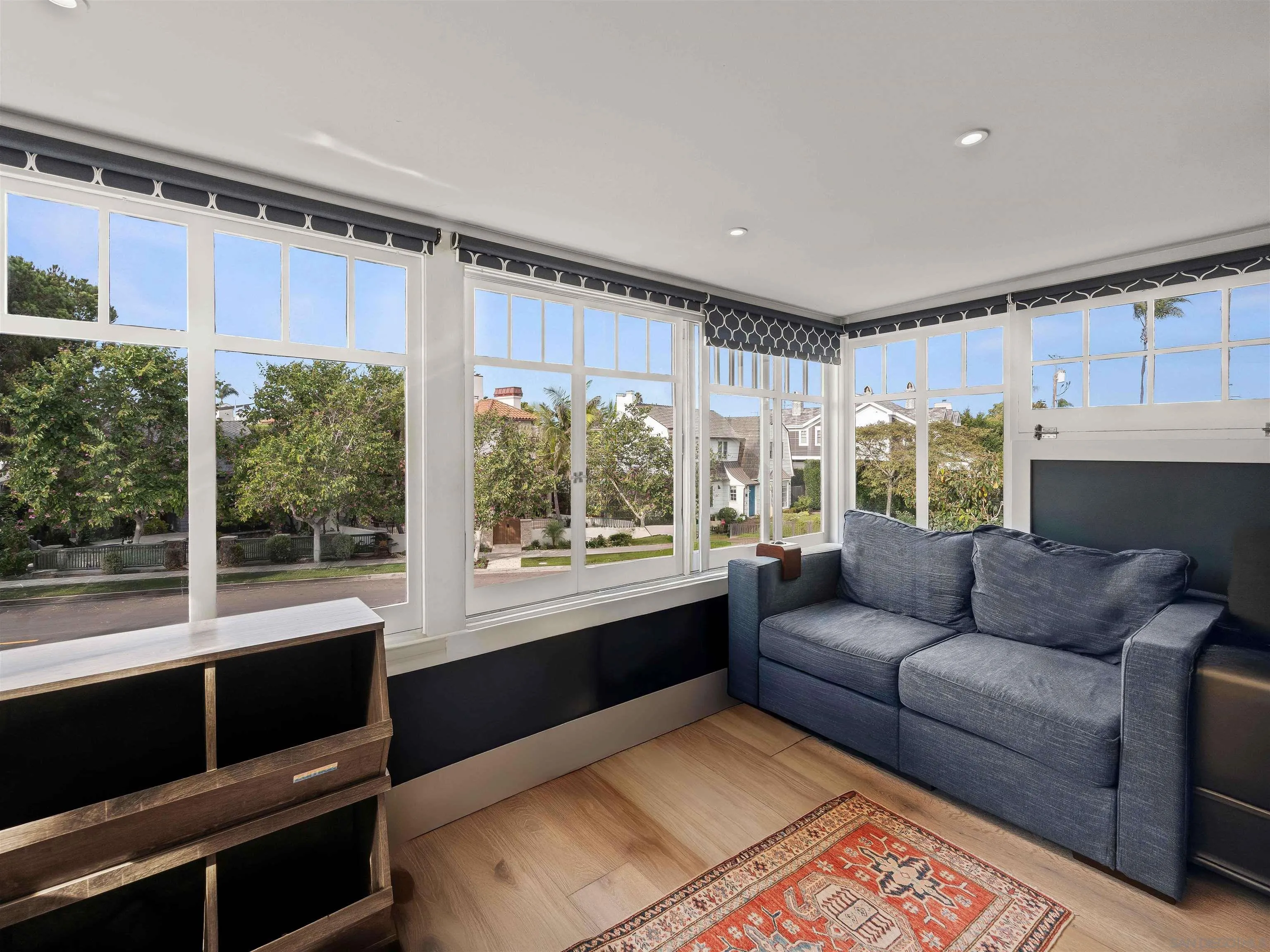 1027 G Avenue Coronado, CA 92118 - Photo 49 of 59 a living room with furniture and a window