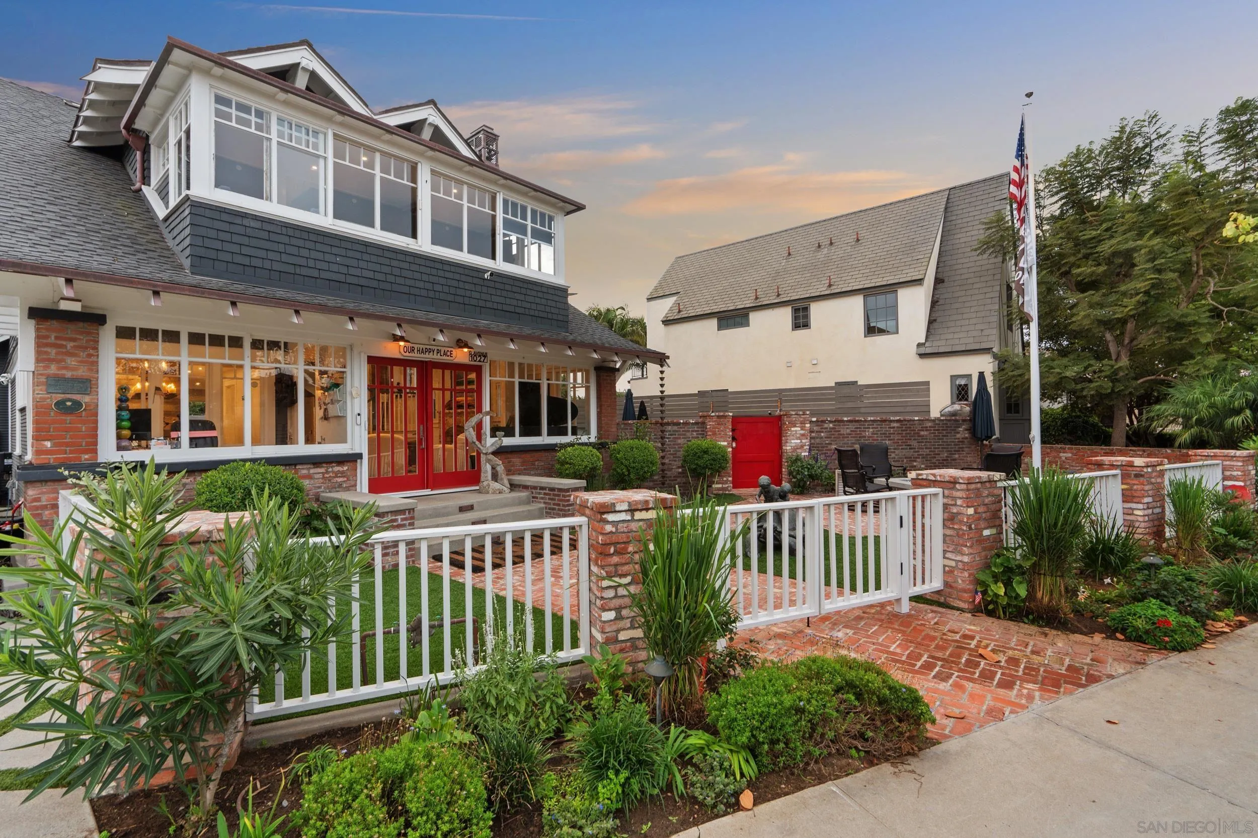1027 G Avenue Coronado, CA 92118 - Photo 52 of 59 a front view of a house with a porch