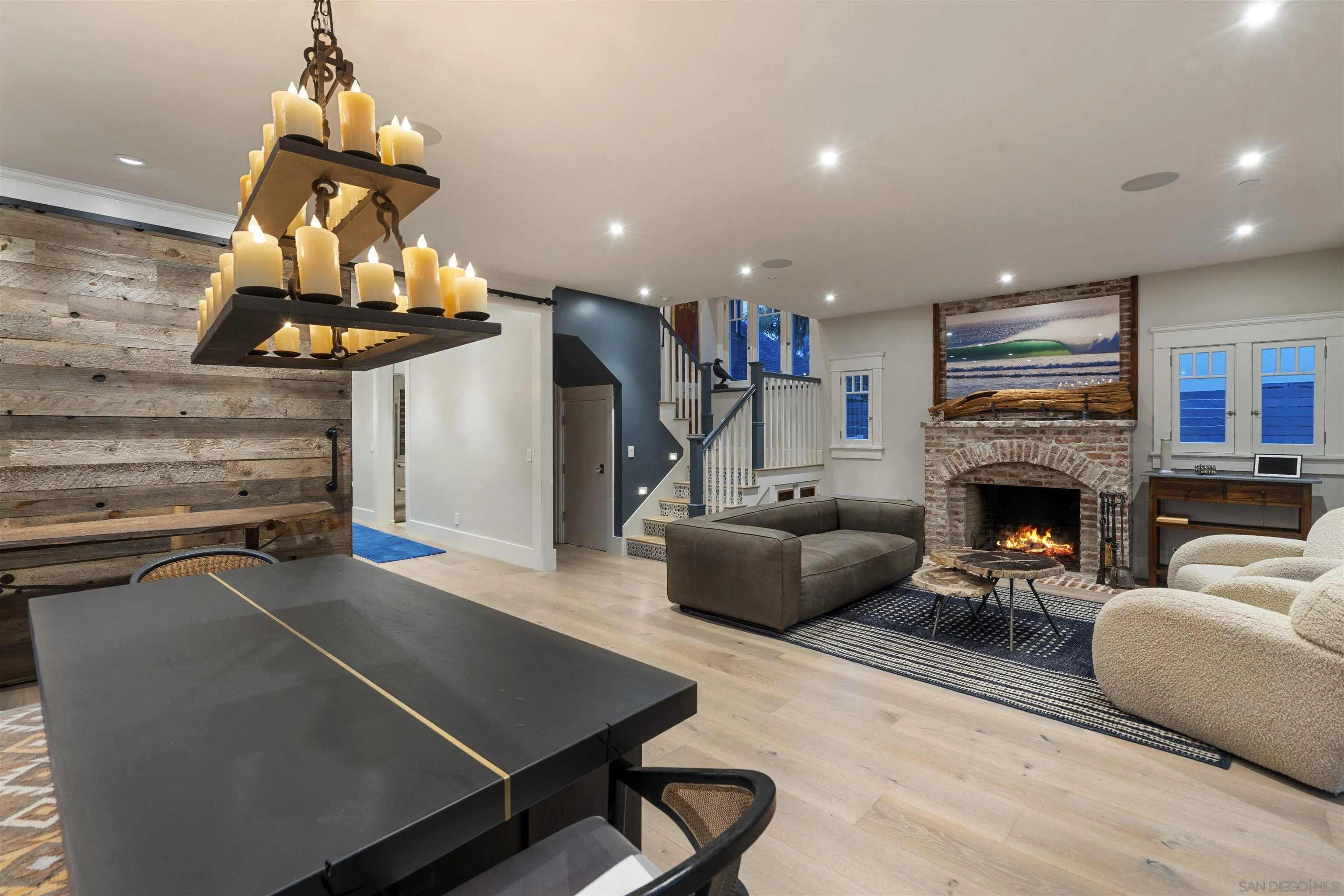 1027 G Avenue Coronado, CA 92118 - Photo 9 of 59 a living room with furniture and a fireplace