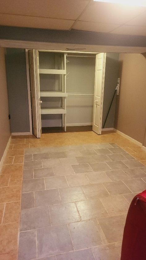 1637 215th Place Sauk Village, IL 60411 - Photo 8 of 11 a view of an empty room with a fireplace