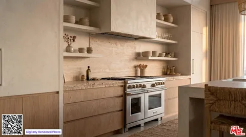 a stove top oven sitting inside of a kitchen