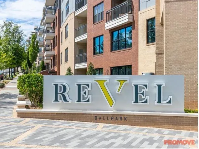 a view of a building with a street