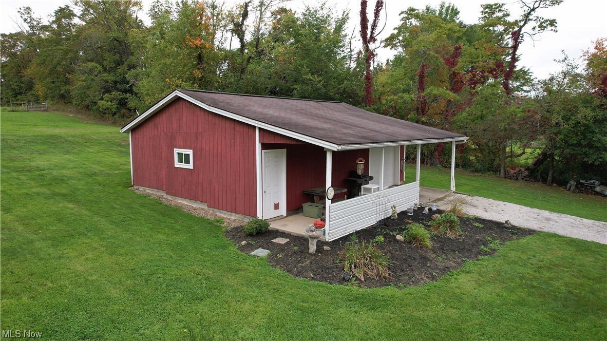 5712 Winchell Road Hiram, OH 44234 - Photo 11 of 31 View of outdoor structure with a lawn