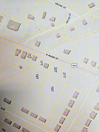 a white refrigerator sitting next to a white refrigerator