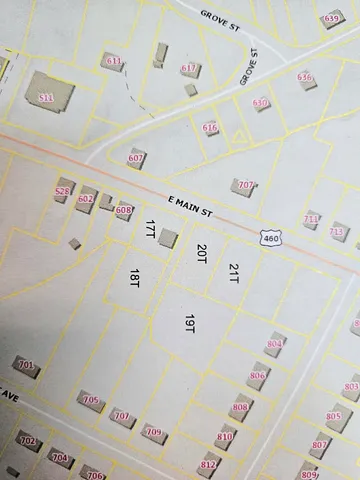 a white refrigerator sitting next to a white refrigerator