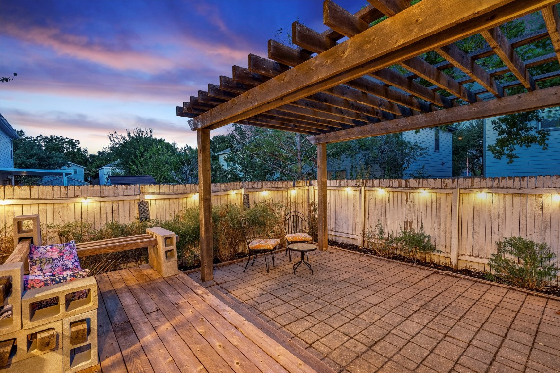 8609 Claude Court Austin, TX 78747 - Photo 17 of 30 a view of sitting area with furniture and wooden deck
