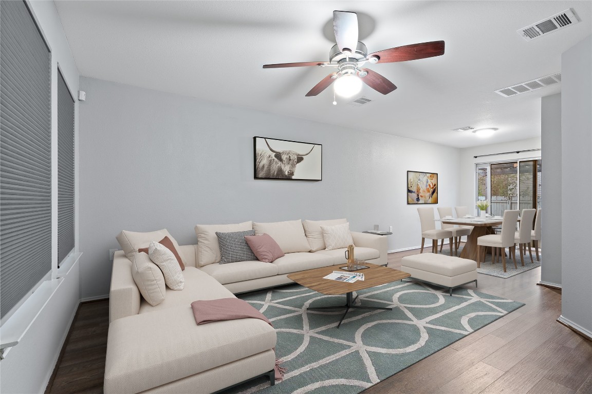 8609 Claude Court Austin, TX 78747 - Photo 2 of 30 a living room with furniture a desk and chair