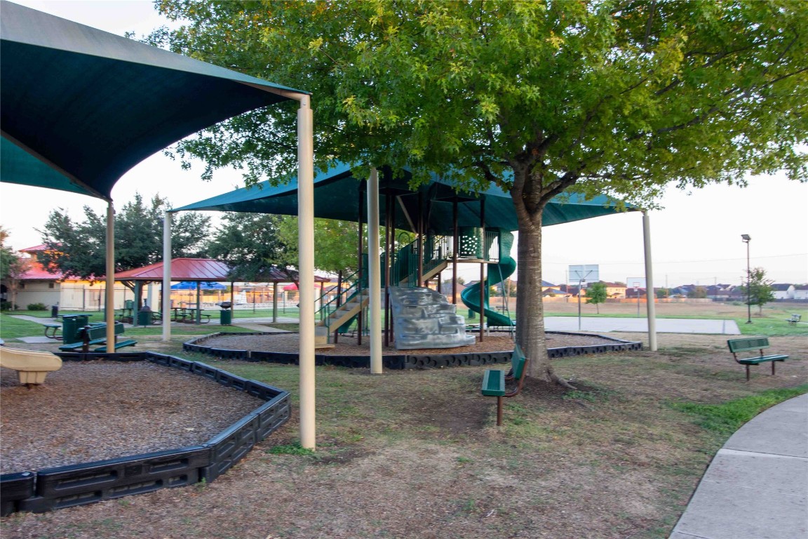 8609 Claude Court Austin, TX 78747 - Photo 30 of 30 a view of a park with slide