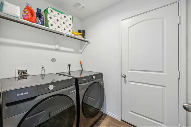 a utility room with dryer and washer