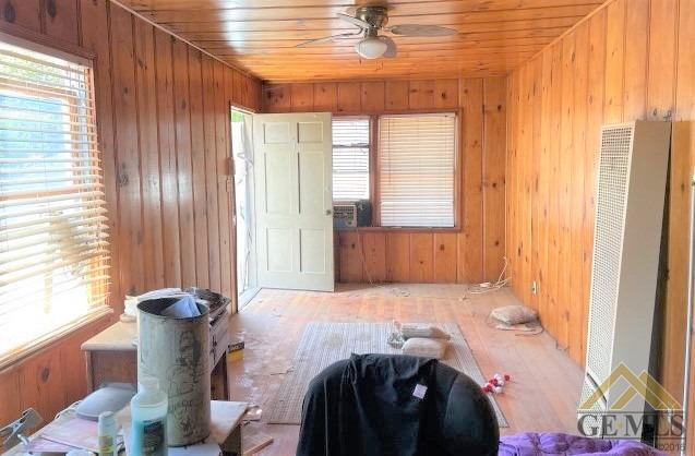 Undisclosed Address Wasco, CA 93280 - Photo 12 of 17 a bedroom with a bed and a window