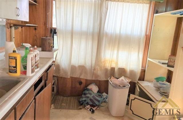 Undisclosed Address Wasco, CA 93280 - Photo 13 of 17 a room with furniture and a window