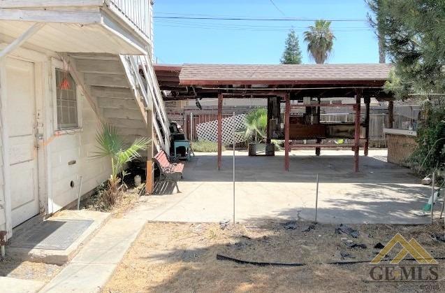 Undisclosed Address Wasco, CA 93280 - Photo 16 of 17 a view of a patio with a table and chairs