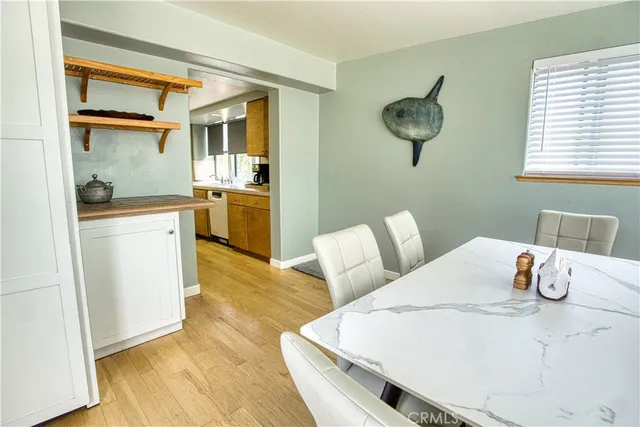 a bedroom with bed and window