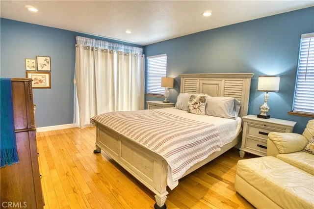 a bedroom with a bed and furniture