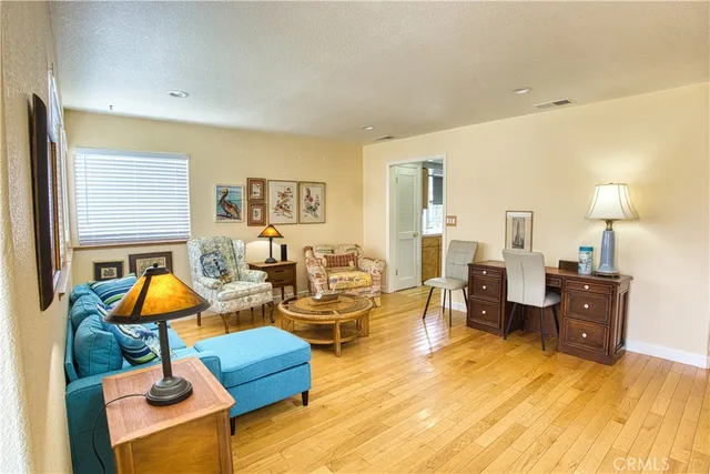 a kitchen with sink and cabinets