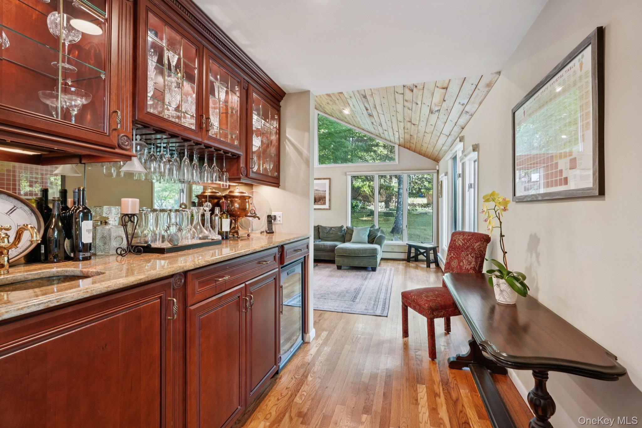 11 Old Phillips Hill Road New City, NY 10956 - Photo 11 of 42 a living room with furniture a large window and wooden floors
