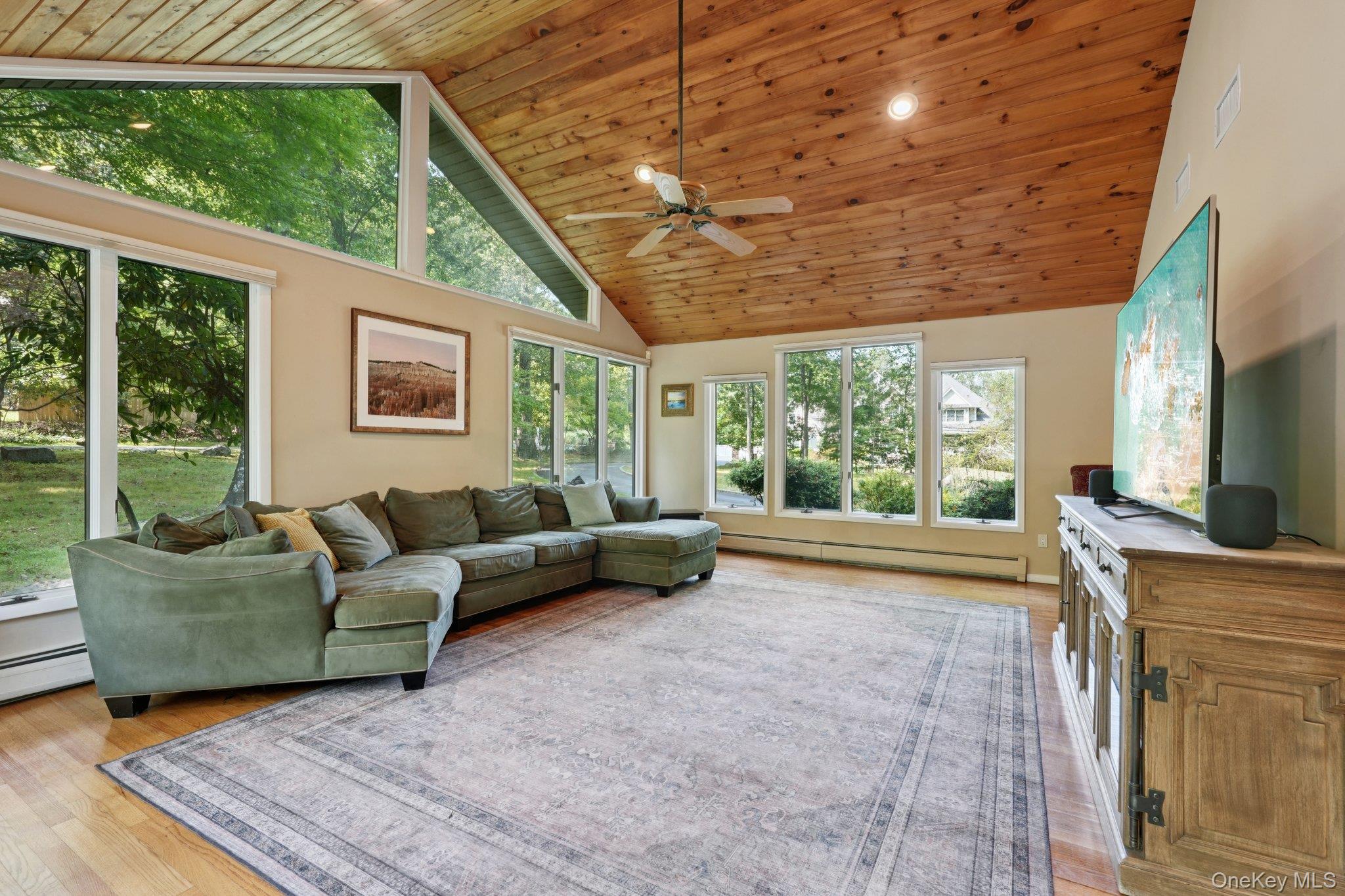 11 Old Phillips Hill Road New City, NY 10956 - Photo 13 of 42 a living room with furniture and a flat screen tv