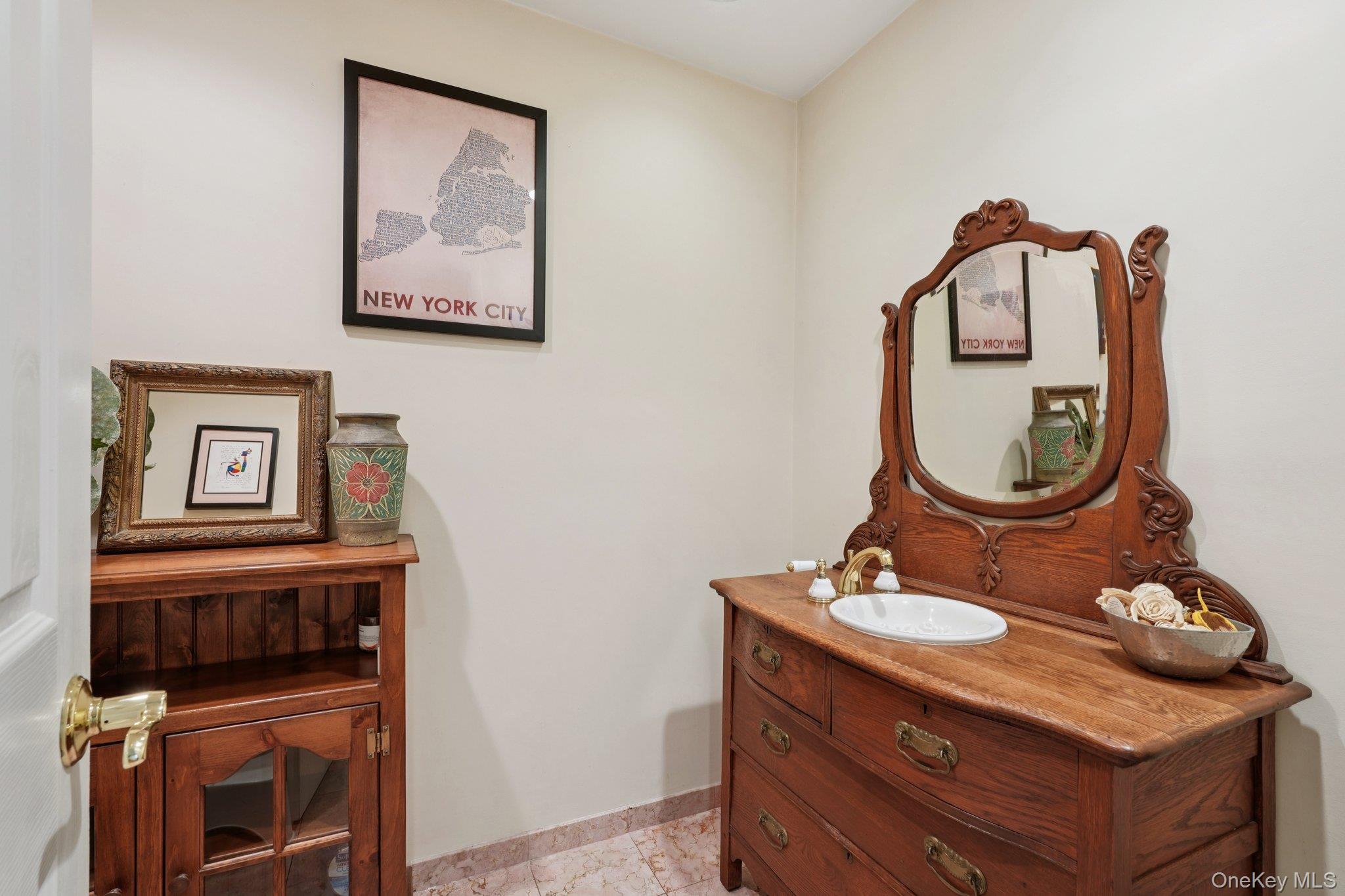 11 Old Phillips Hill Road New City, NY 10956 - Photo 15 of 42 a bathroom with a sink and a mirror
