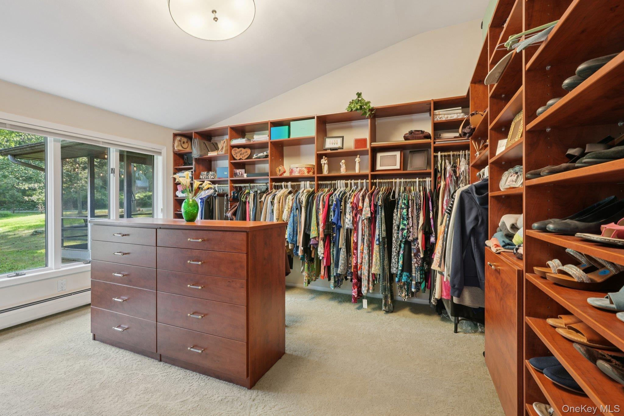 11 Old Phillips Hill Road New City, NY 10956 - Photo 20 of 42 a view of walk in closet with clothes and shoes