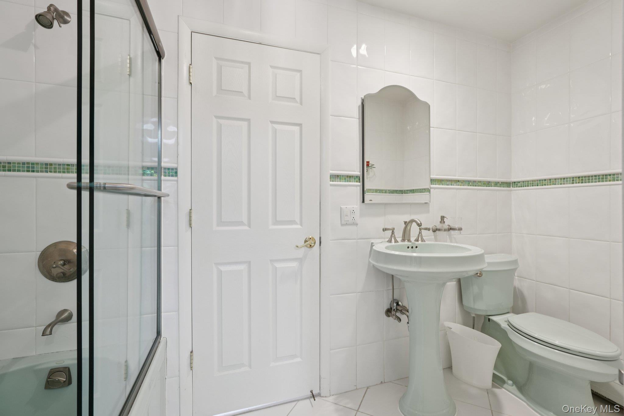 11 Old Phillips Hill Road New City, NY 10956 - Photo 23 of 42 a bathroom with a sink a toilet and shower