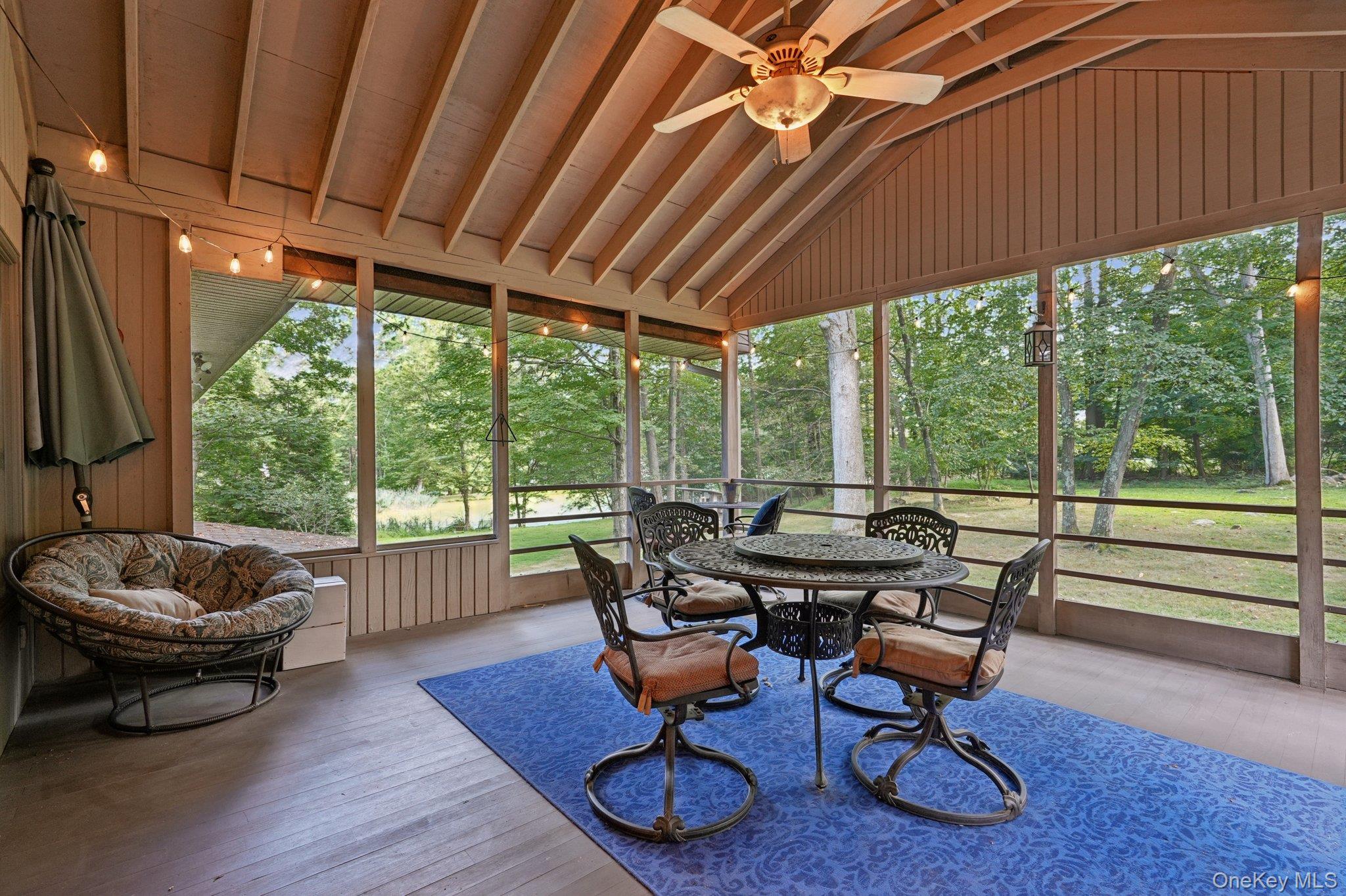 11 Old Phillips Hill Road New City, NY 10956 - Photo 25 of 42 a living room with furniture and a large window